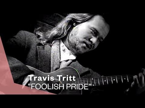Foolish Pride (Single Version) (Official Music Video) | Warner Vault by Travis Tritt - Album Art